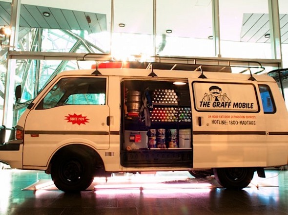 The graffiti bus with all the tools of a graffiti artist.